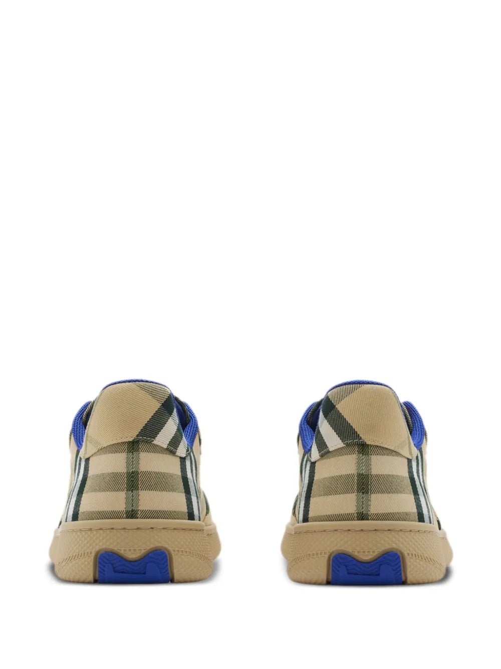 Back view of beige low-top sneakers with green/black check fabric heel and blue lining