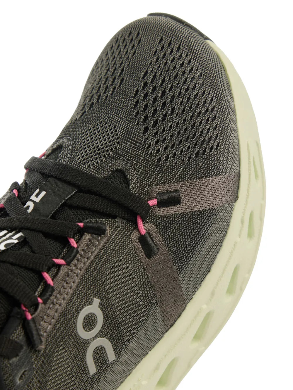 Dark gray-green knit upper running shoe with black laces and side logo
