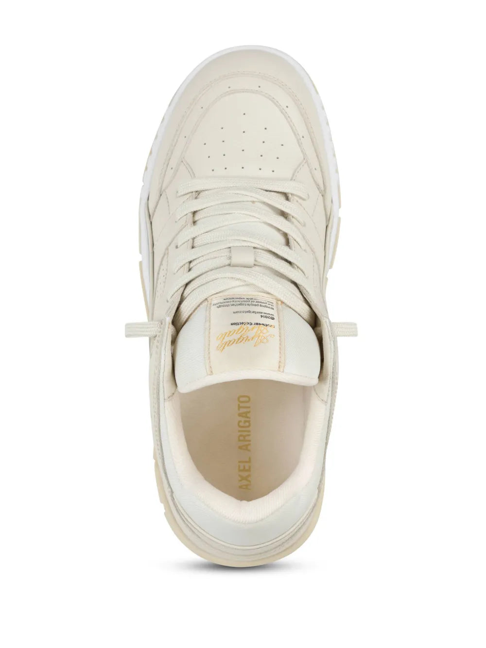 Beige low-top sneakers, inside view of tongue and lace-up opening