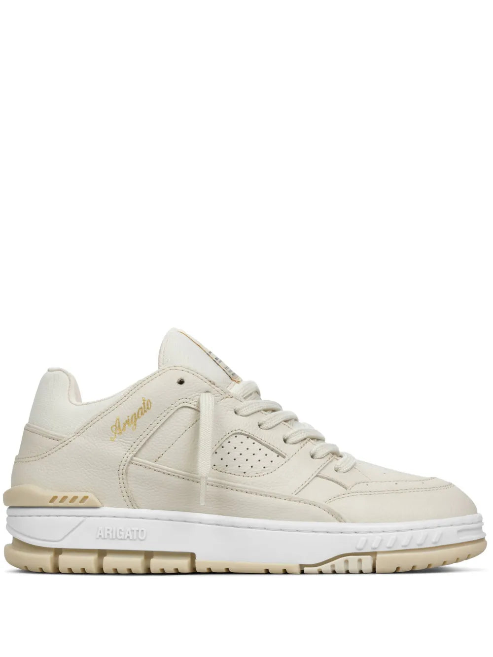Beige low-top sneakers with lace-up closure and gold logo detailing