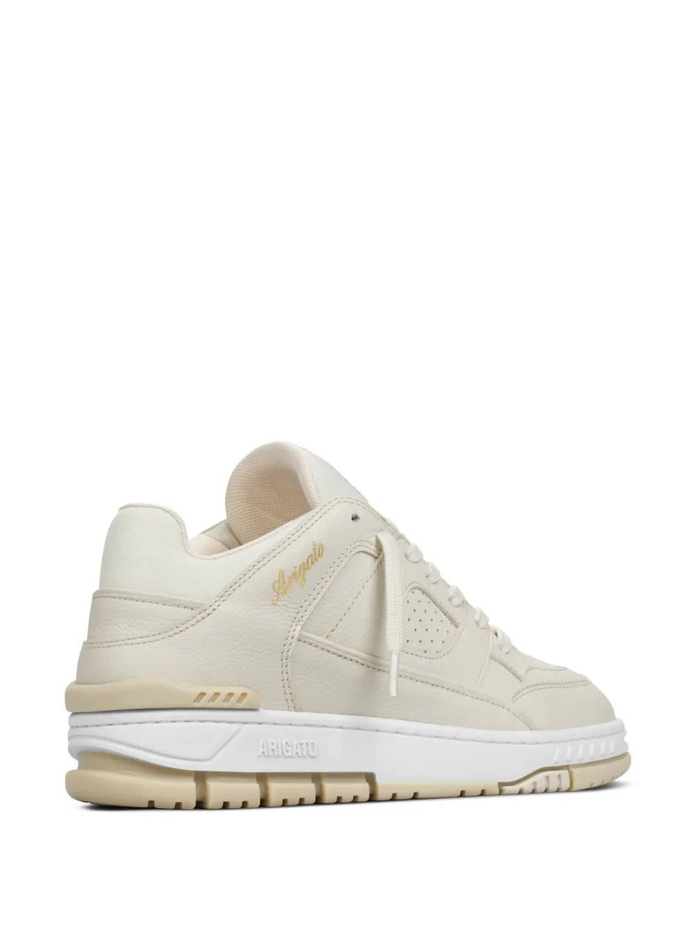 Beige low-top sneakers, rear side view with cushioned collar and logo