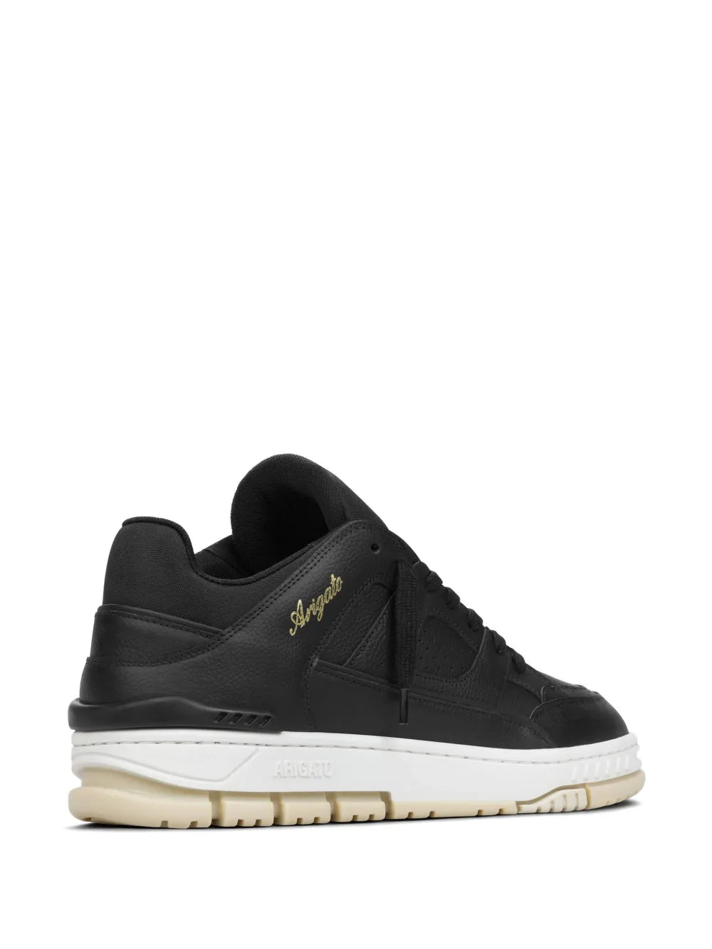 Black low-top sneakers with side panel logo embroidery and beige outsole edge