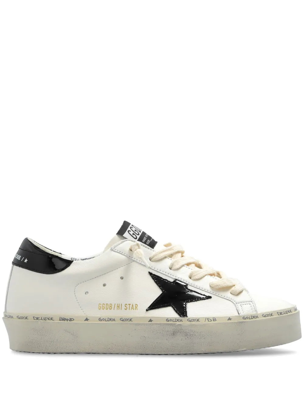 White leather low-top sneakers with black side panel and lace-up closure