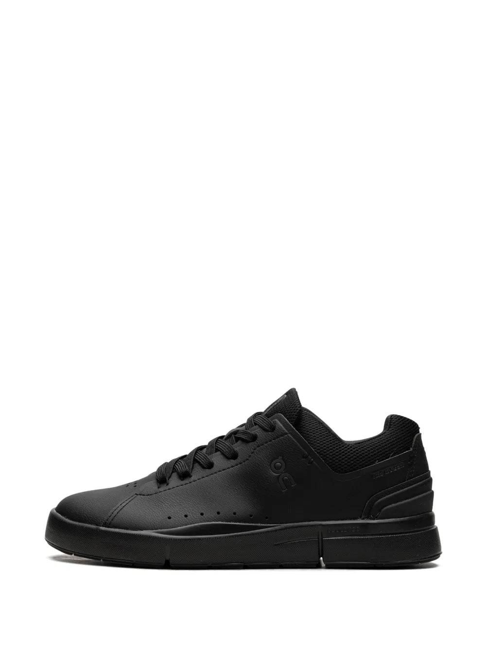 Black low-top lace-up sneaker, front quarter view with lace-up and smooth upper