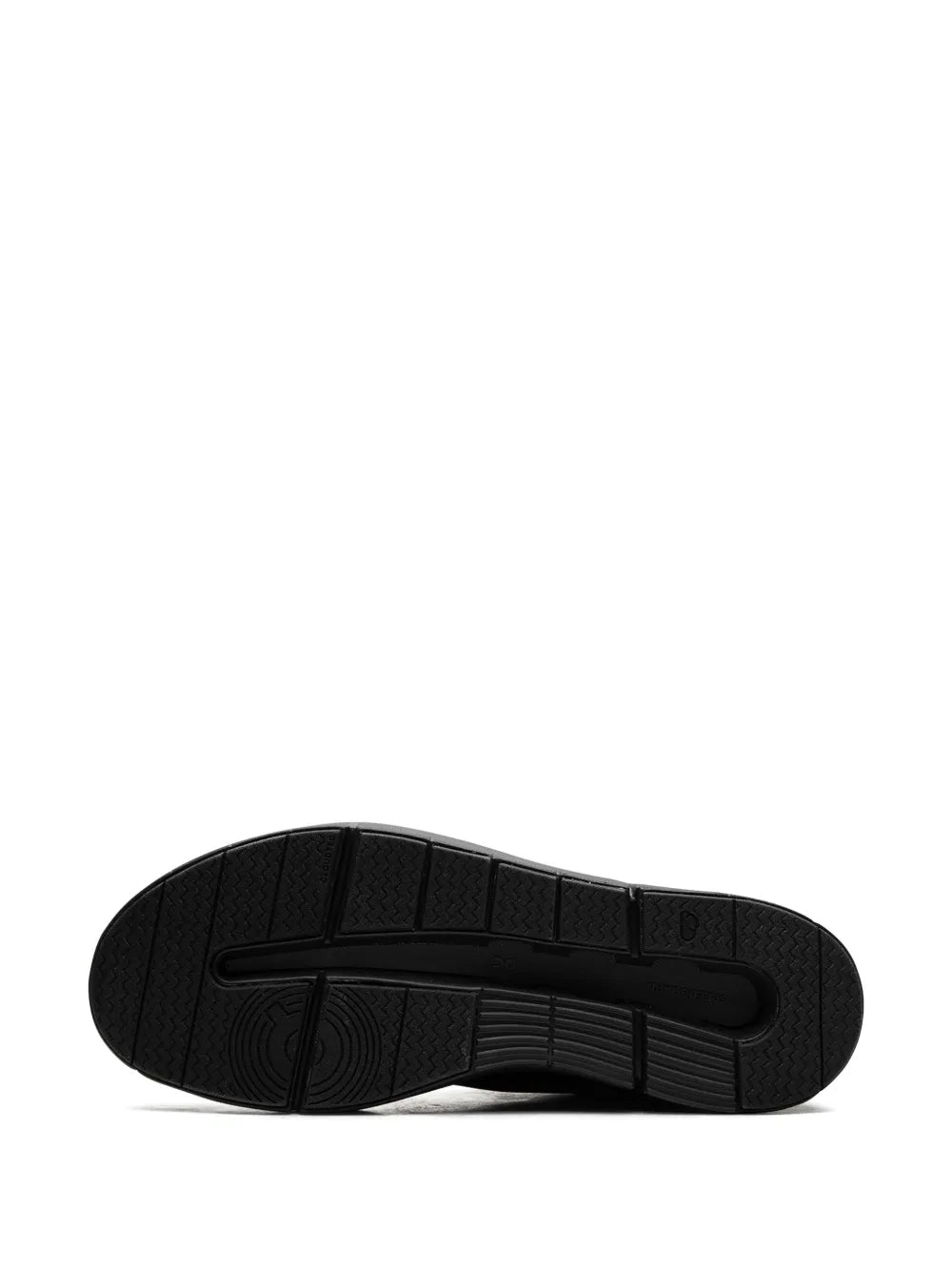 Black rubber outsole with textured tread pattern