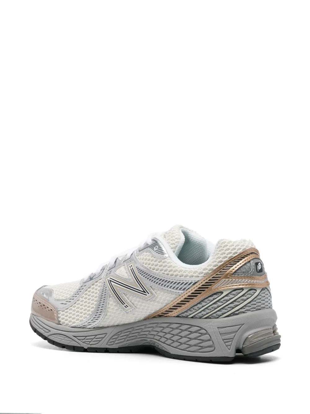 New Balance 860V2 running sneakers, side view with bronze-trimmed heel and grey sole