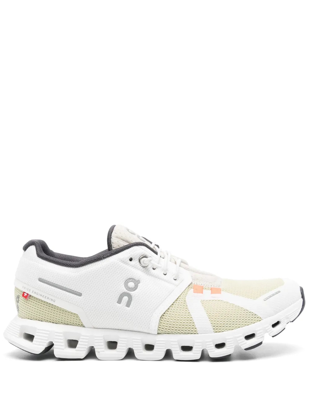 White lace-up running shoe with beige side panels and black heel cap