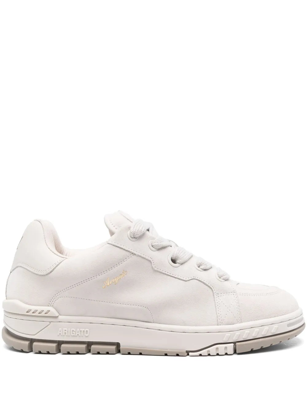 White leather low-top sneakers with lace-up front and textured rubber sole