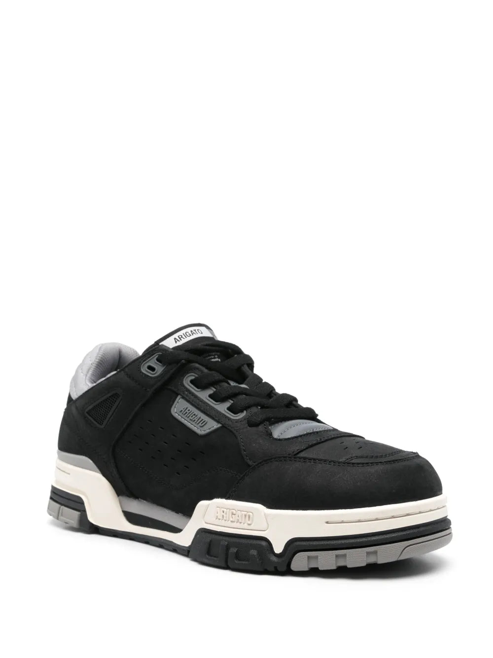 Black low-top lace-up sneakers with perforated panels and off-white midsole