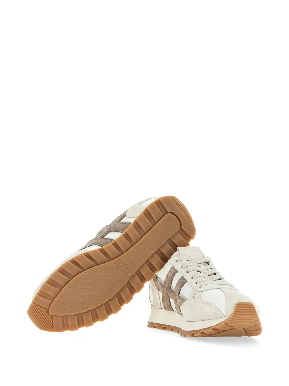 Hogan H671 sneakers outsole view, off-white uppers with taupe detailing; brown treaded sole