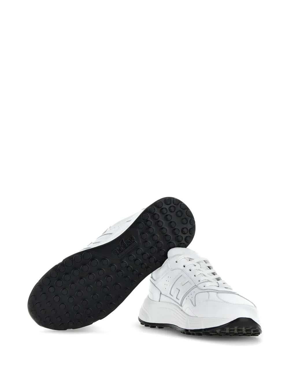 White Hogan Hyperlight sneakers with dark rubber outsole and textured tread