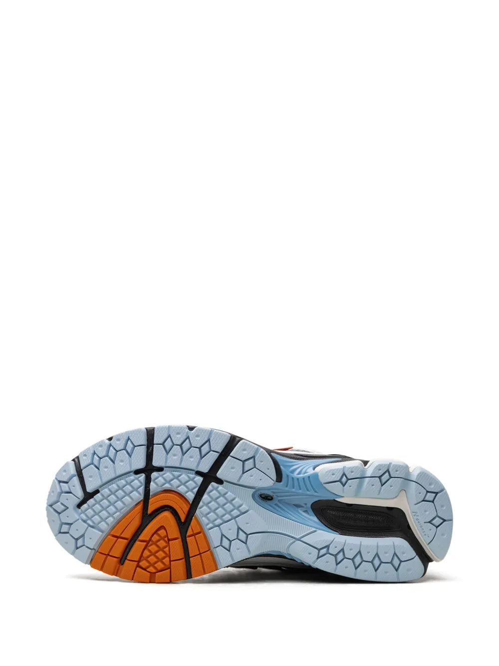 New Balance 1906R sneaker outsole with blue traction pods and orange heel detail