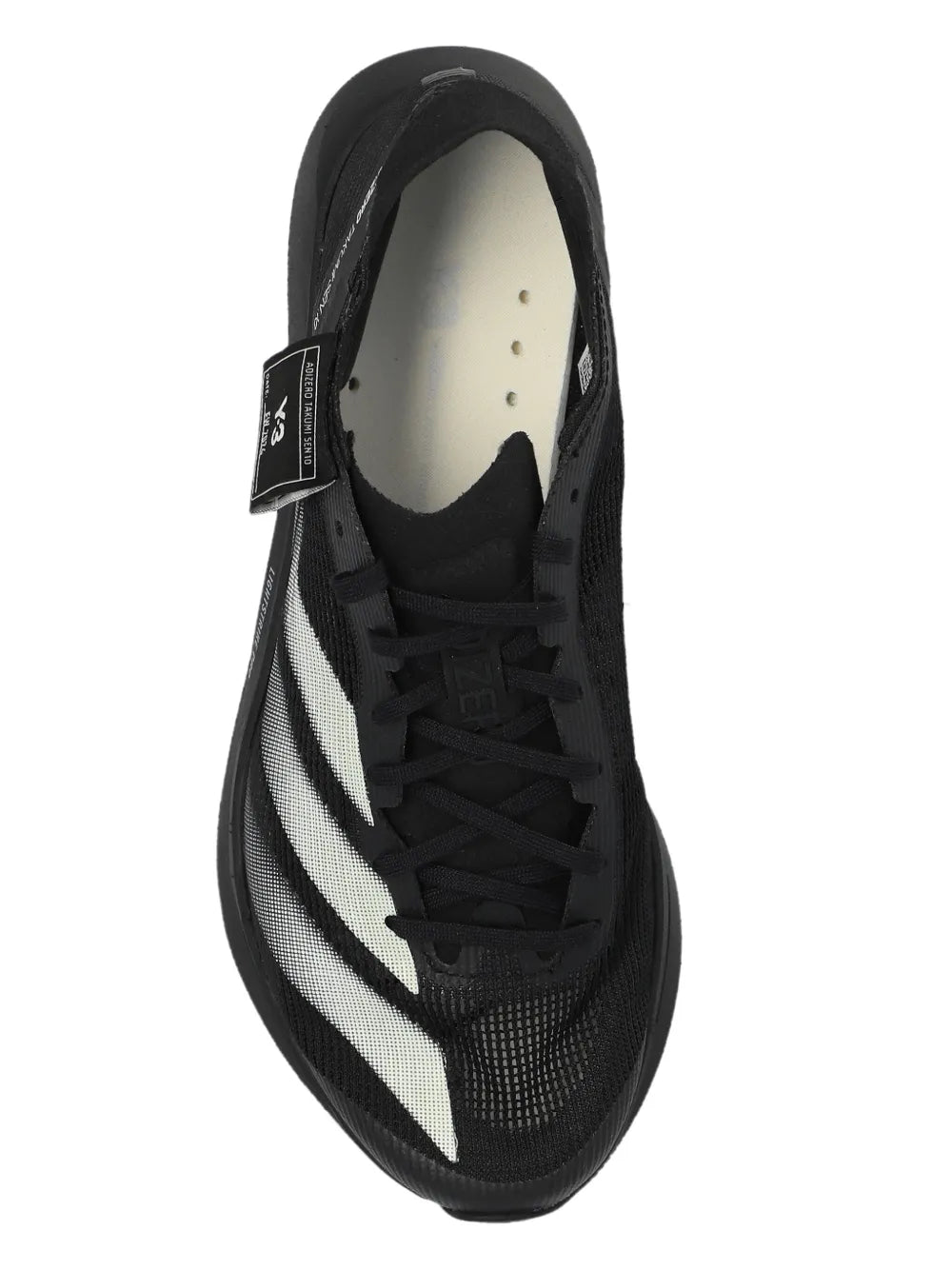 Black lace-up sneaker with mesh texture, white diagonal side stripe, and padded collar