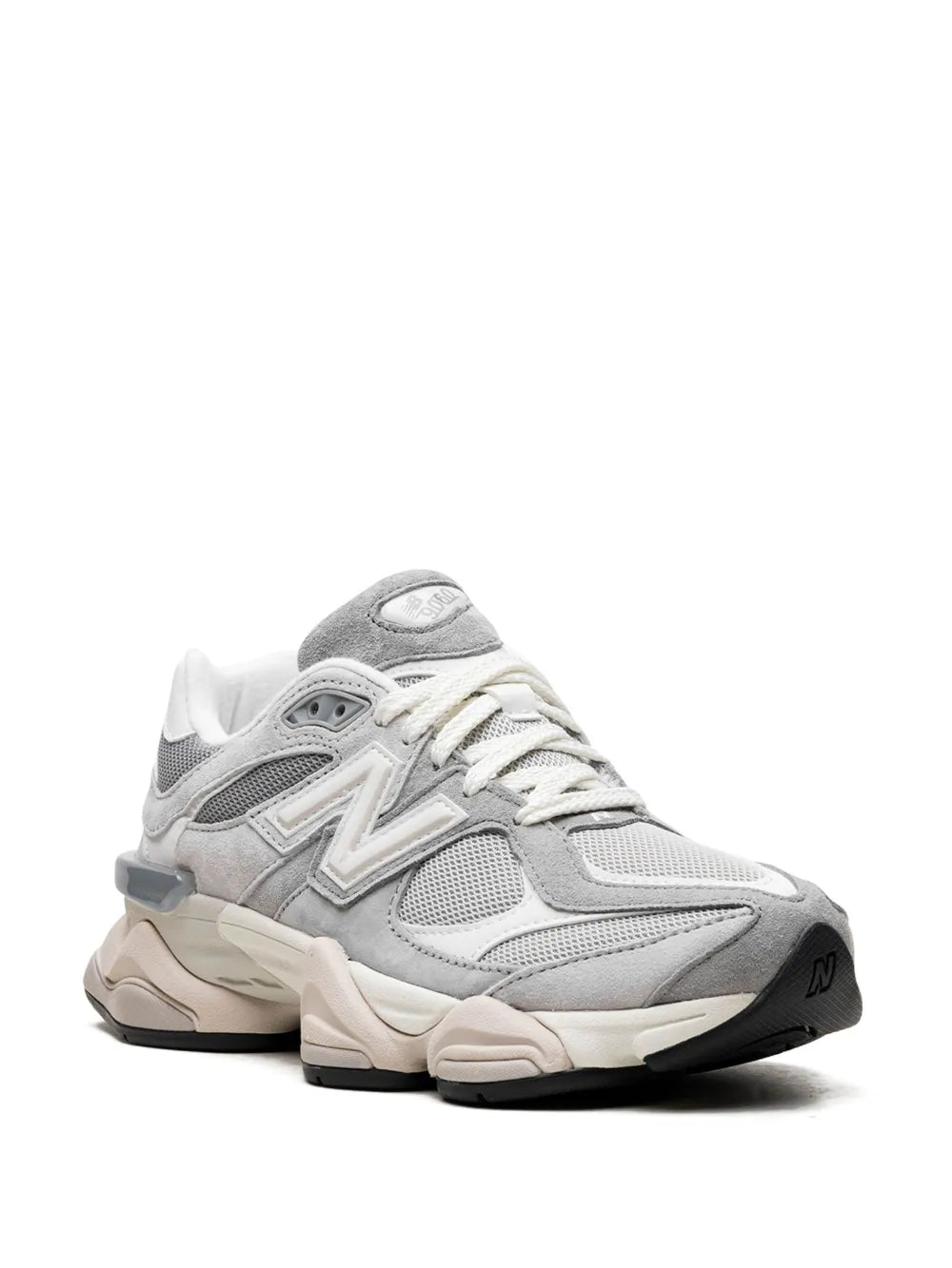 Grey lace-up sneakers with white laces, N logo, and cushioned chunky midsole