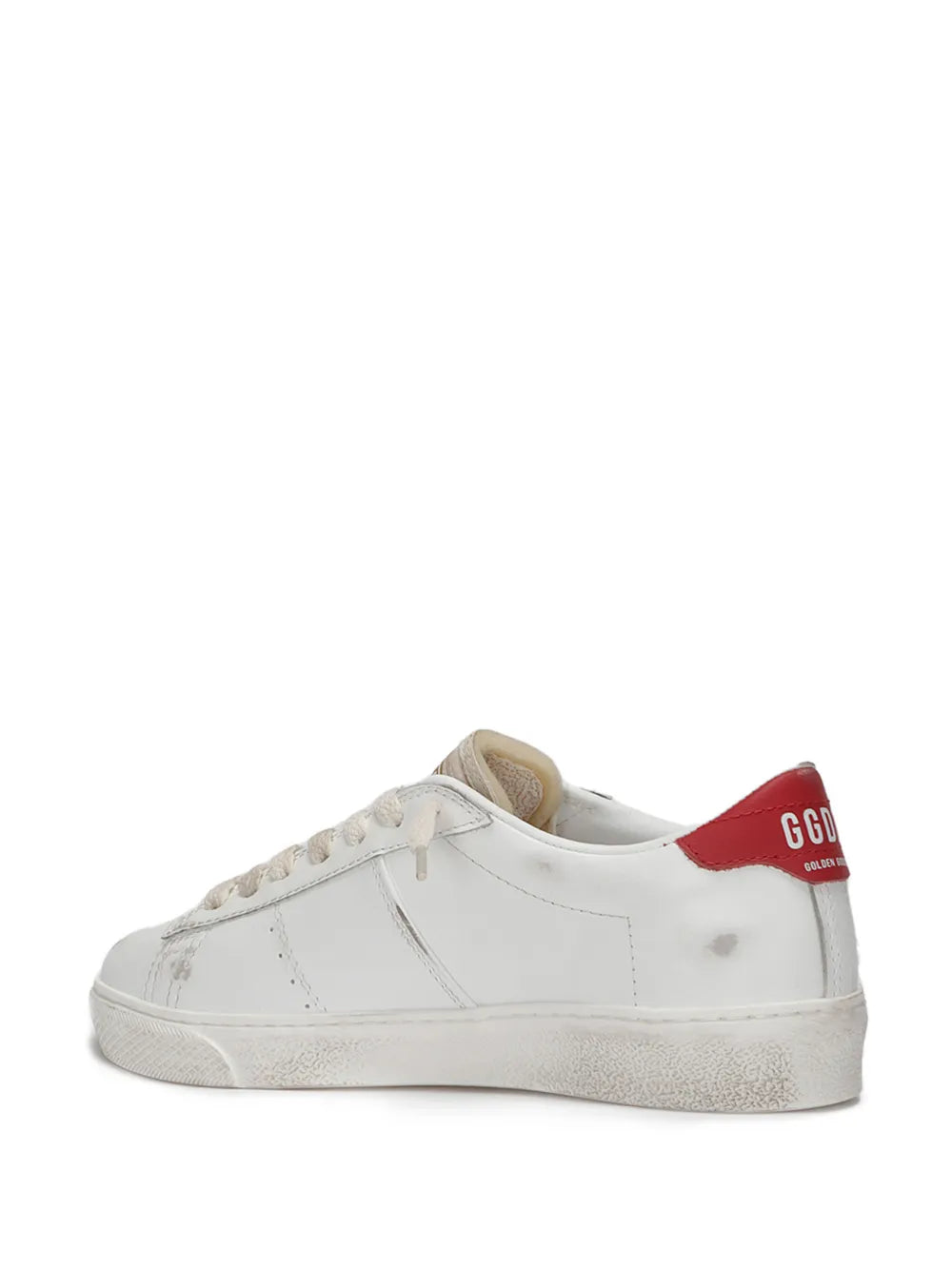 White low-top sneaker with red heel patch and tan lace-up, worn rubber sole