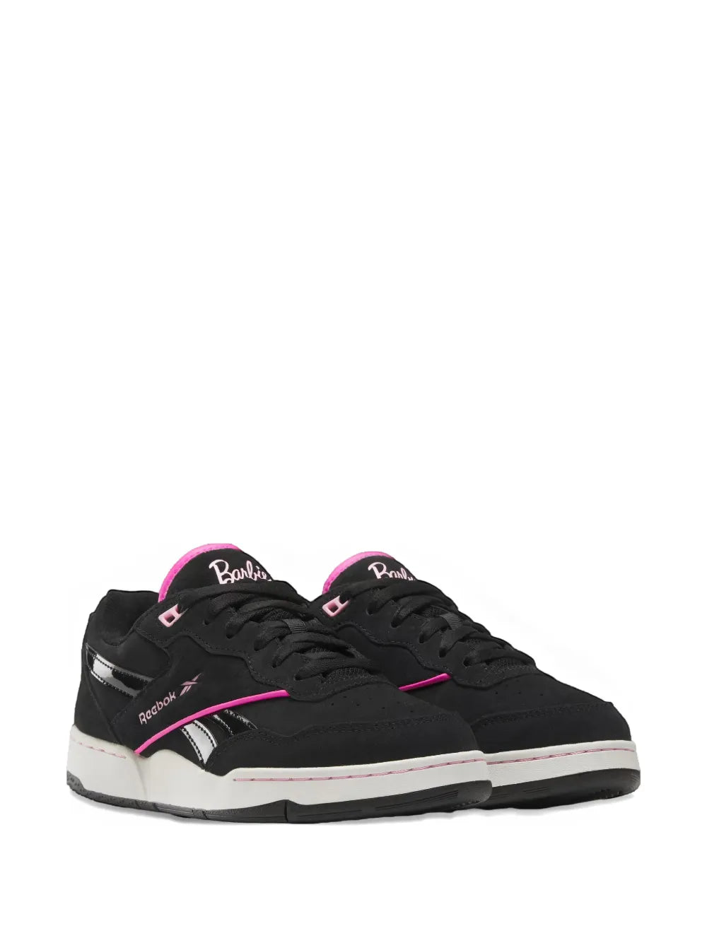 Black low-top sneaker pair with pink accents, lace-up front and side Reebok logo.