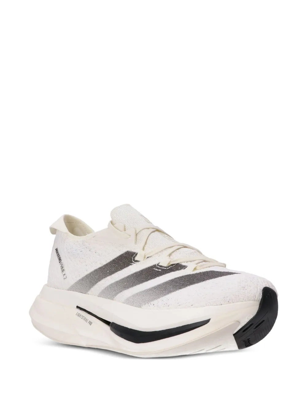 Strung sneakers in off-white with bold black side stripes, lace-up, thick sole