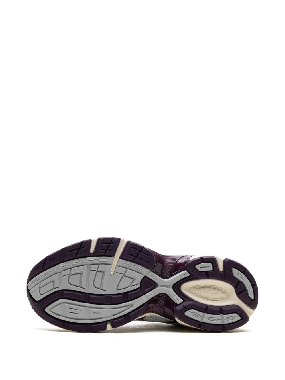 White and maroon sneaker outsole with textured traction tread