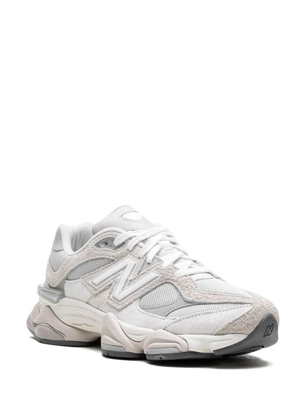 Grey New Balance 9060 sneakers side view, lace-up with contrast N logo