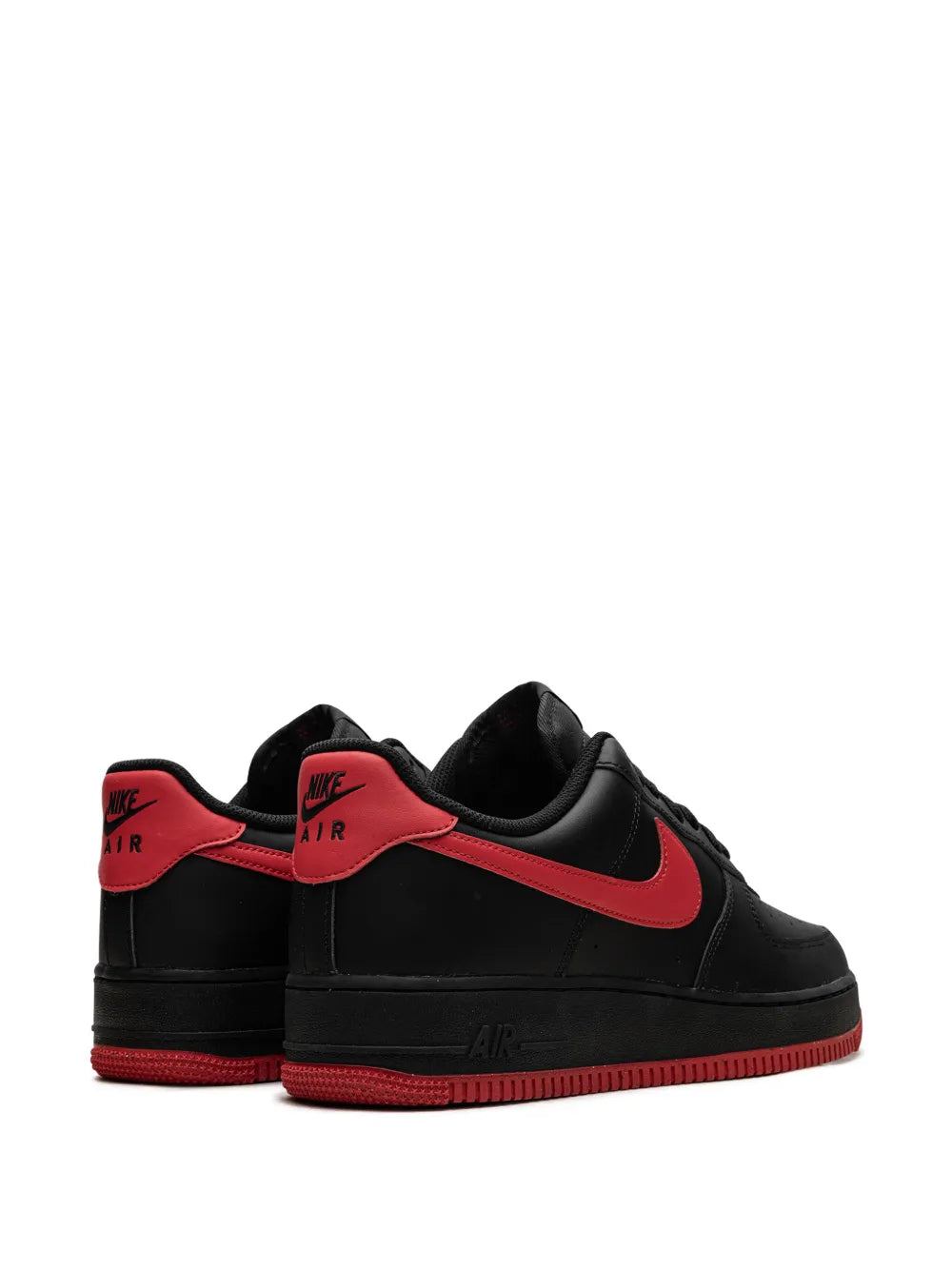 Black Nike Air Force 1 Low sneakers rear view with red heel panel and lace-up