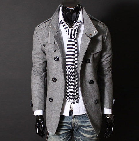 Men's gray double-breasted wool coat with notch lapels and flap pockets.