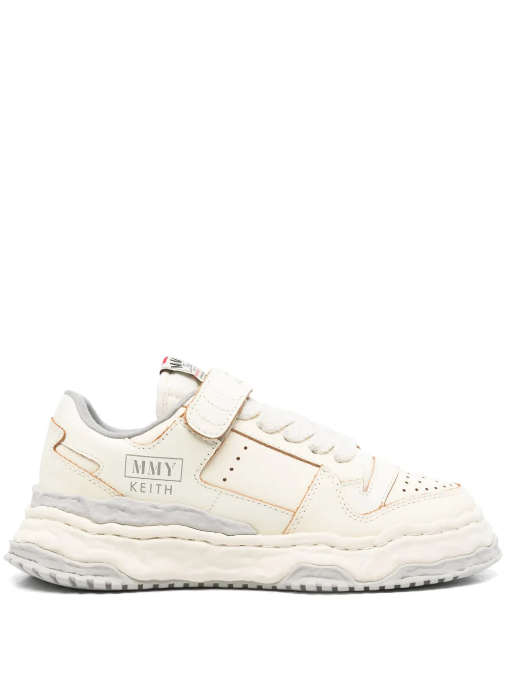 White canvas sneakers, tan trim, lace-up, chunky wavy rubber sole