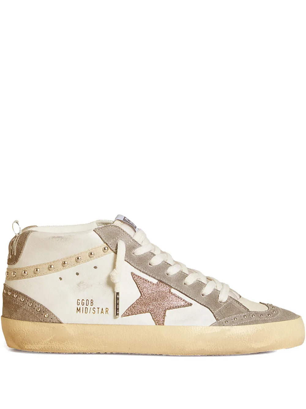 Mid-top sneaker with white laces, gray suede panels, tan sole, side star logo