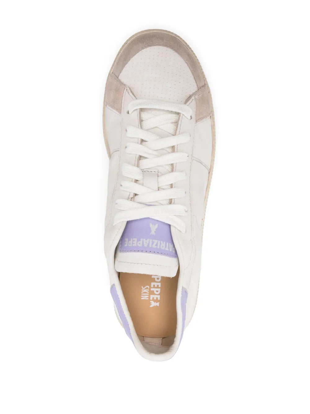 White lace-up sneaker with beige insole and lavender heel details, brand text visible