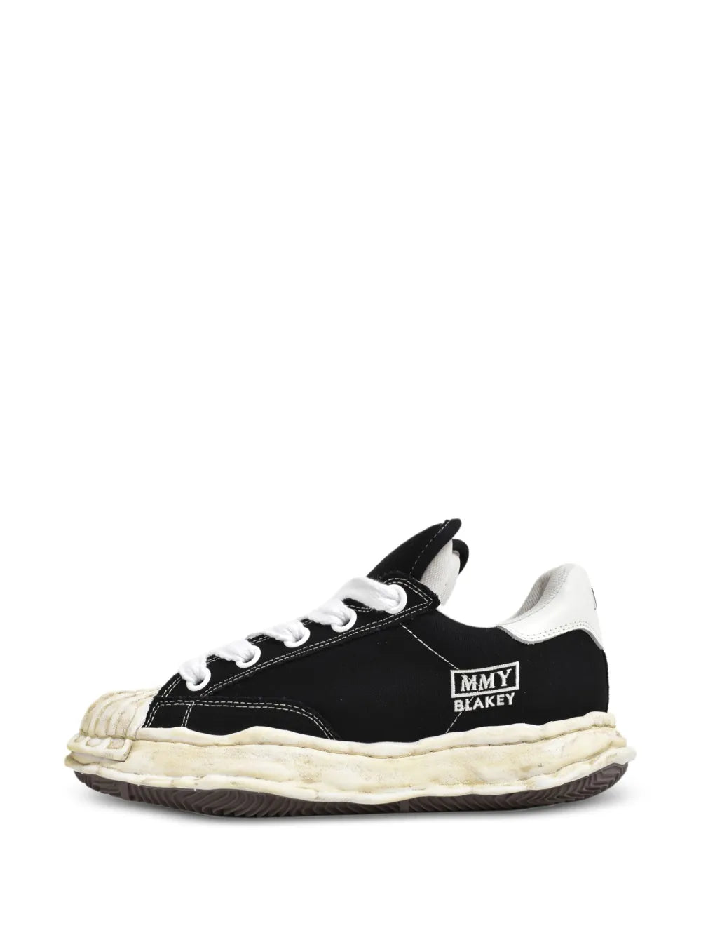Black low-top trainers with white laces and off-white sole, front view