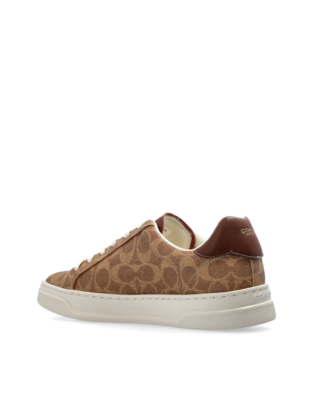 Brown Coach sneaker from heel and side, signature canvas with white sole