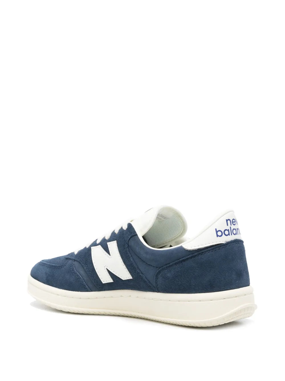 Navy suede sneakers with white N logo, heel branding, and off-white rubber sole