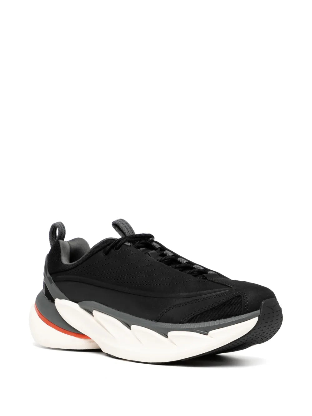 Black lace-up athletic sneakers with sculpted white sole and orange/red side stripe