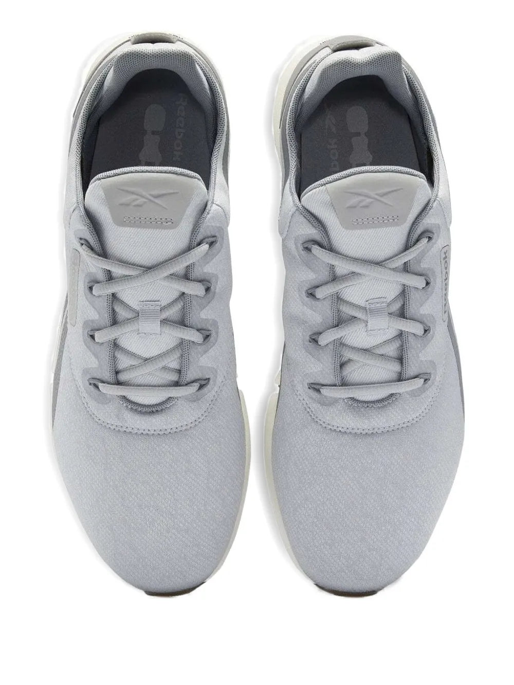 Pair of grey lace-up sneakers with padded tongue and laces