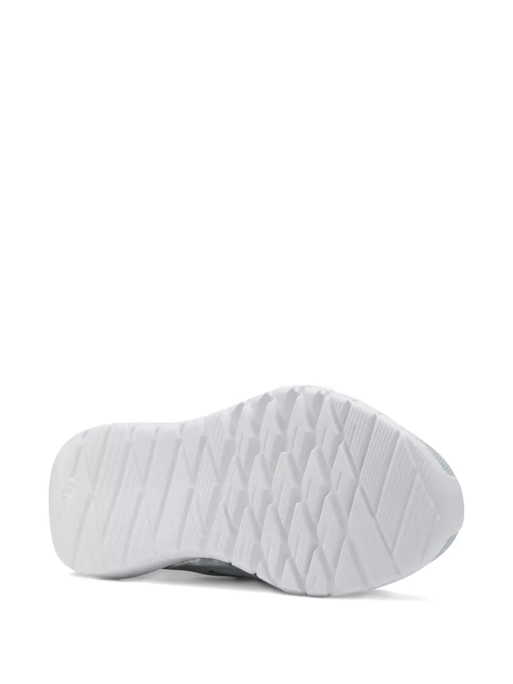 Shoe outsole view: white tread sole under light green running sneaker