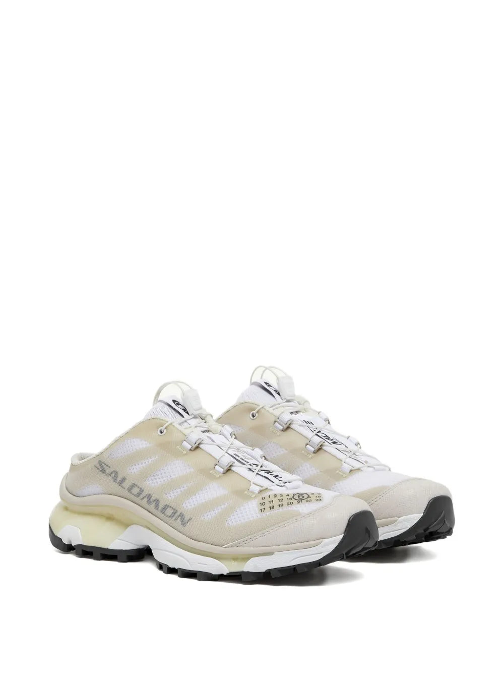 Light beige panelled mule sneakers with Salomon logo, lace-up front, chunky sole