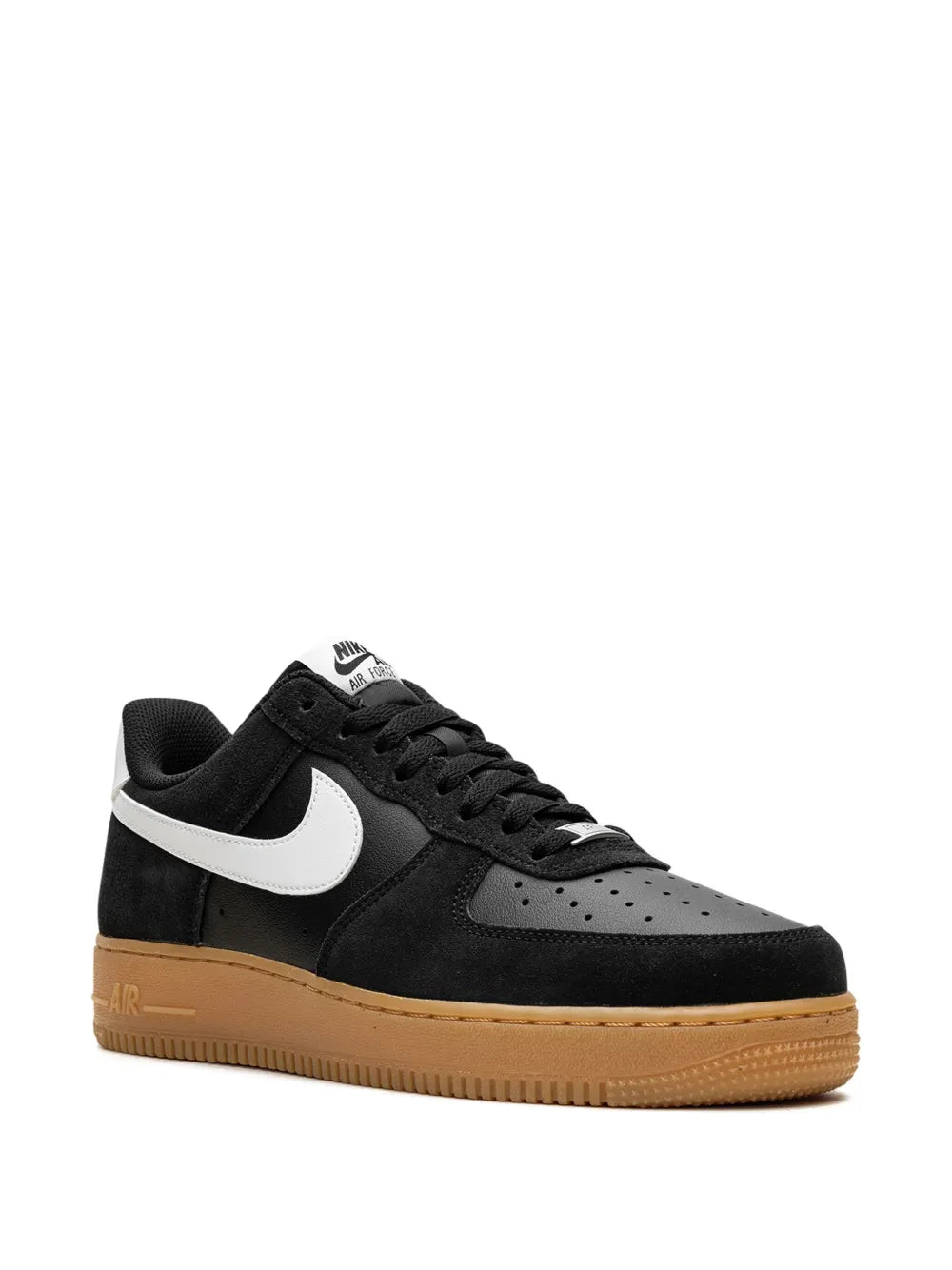 Black Nike low-top sneakers, white swoosh, lace-up front, gum sole