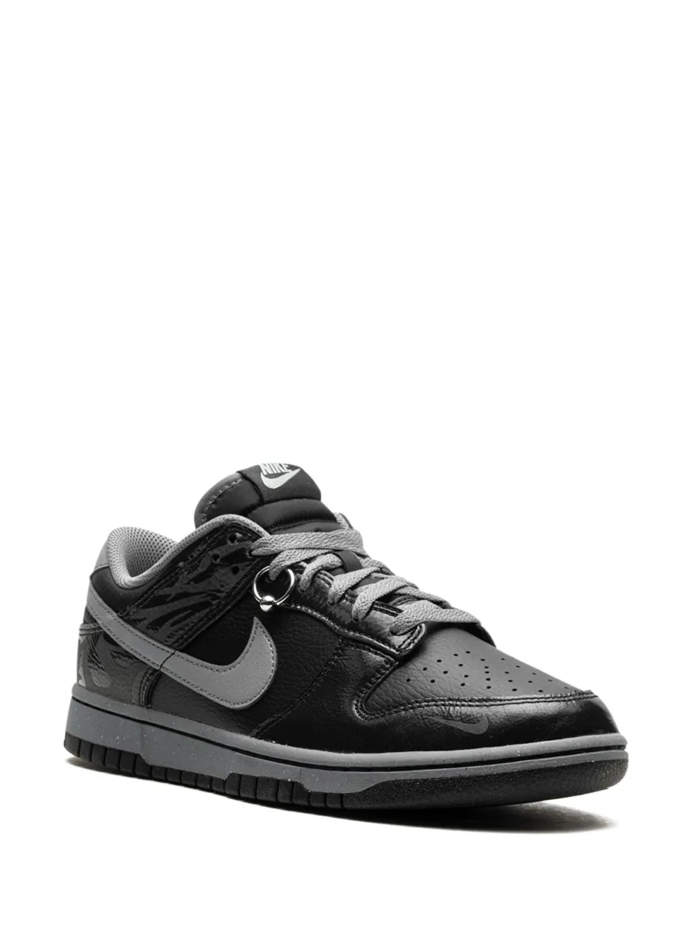 Nike black low-top sneakers, lace-up with gray Swoosh and dark rubber tread sole