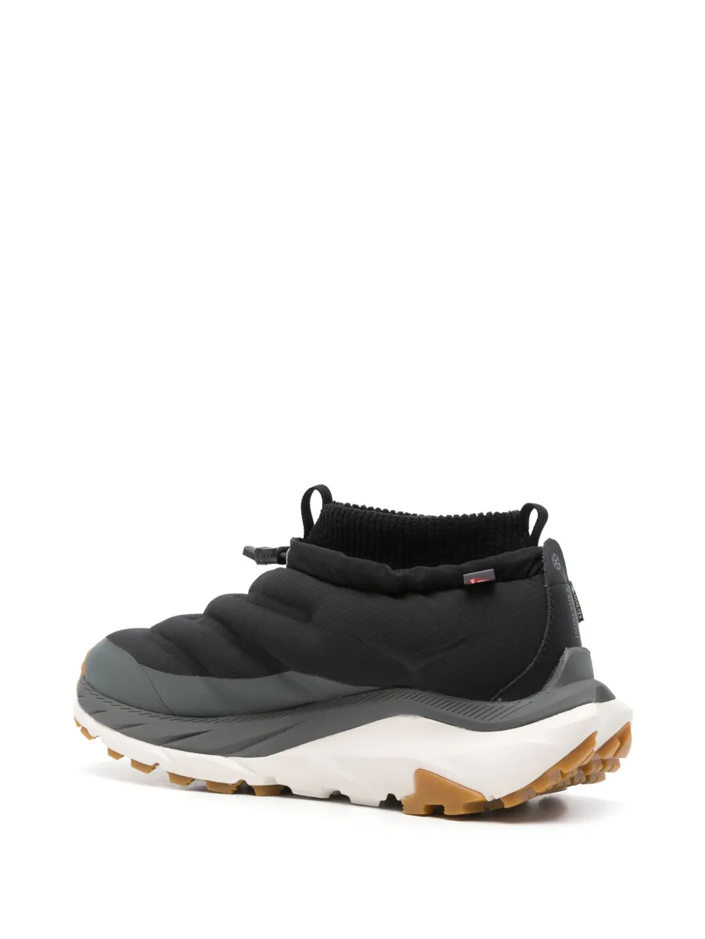 Black high-top sneakers with padded collar, quilted panels, white midsole, gum tread