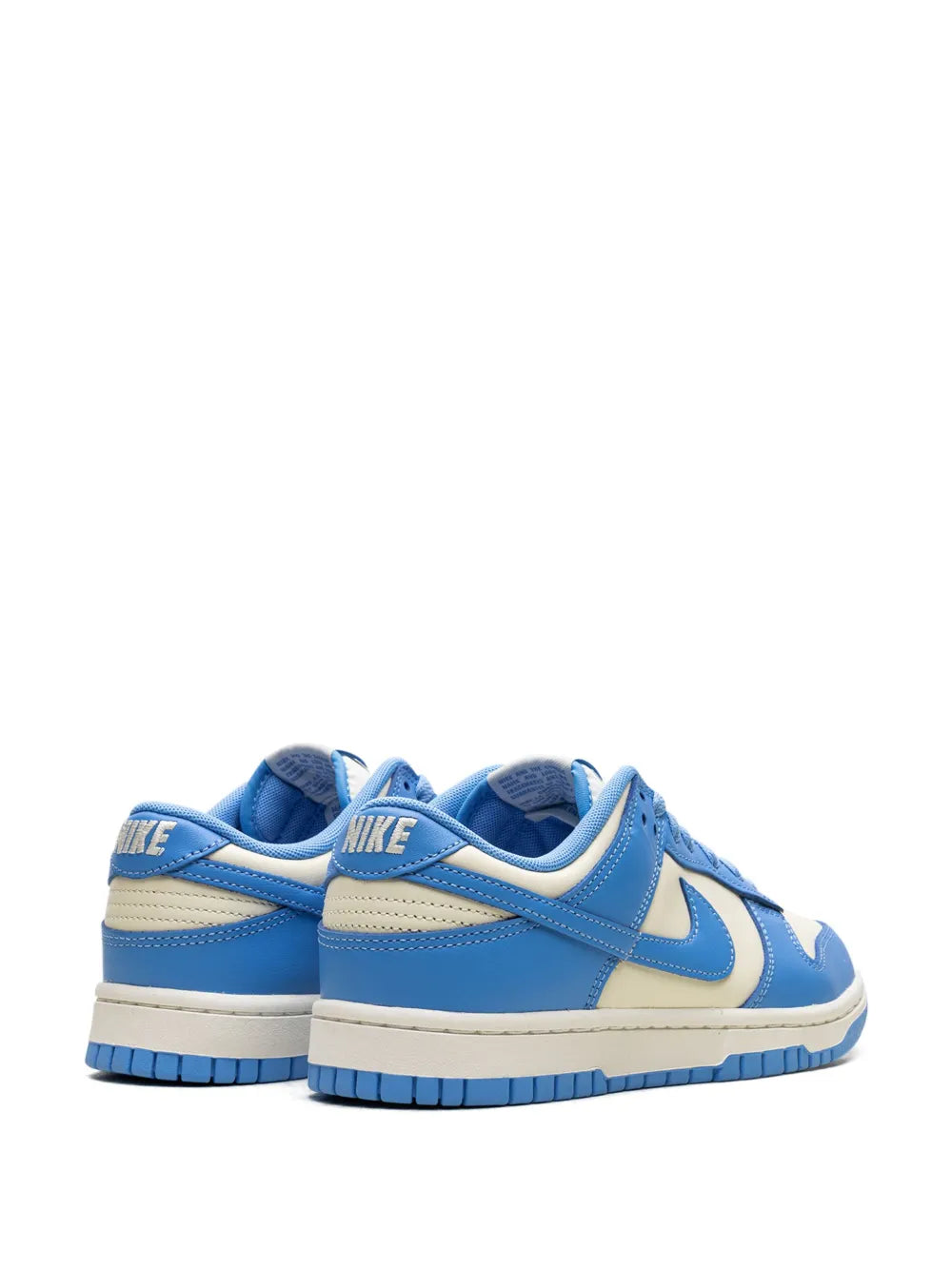 Blue and white low-top sneakers with heel branding and side swoosh