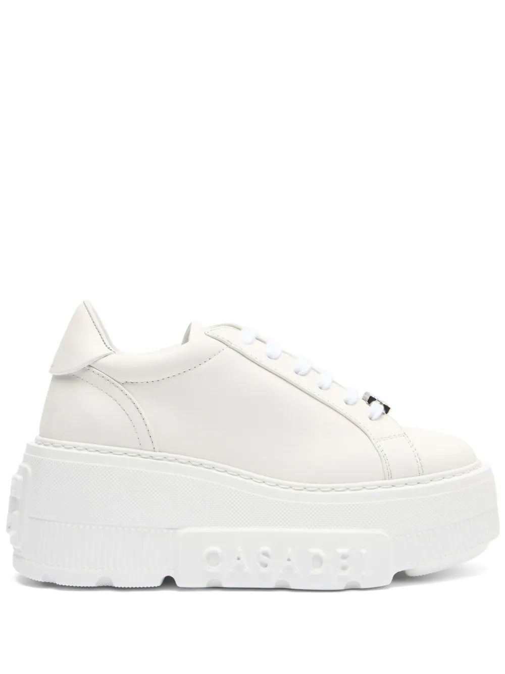 White leather platform sneakers with lace-up front and silver jeweled emblem