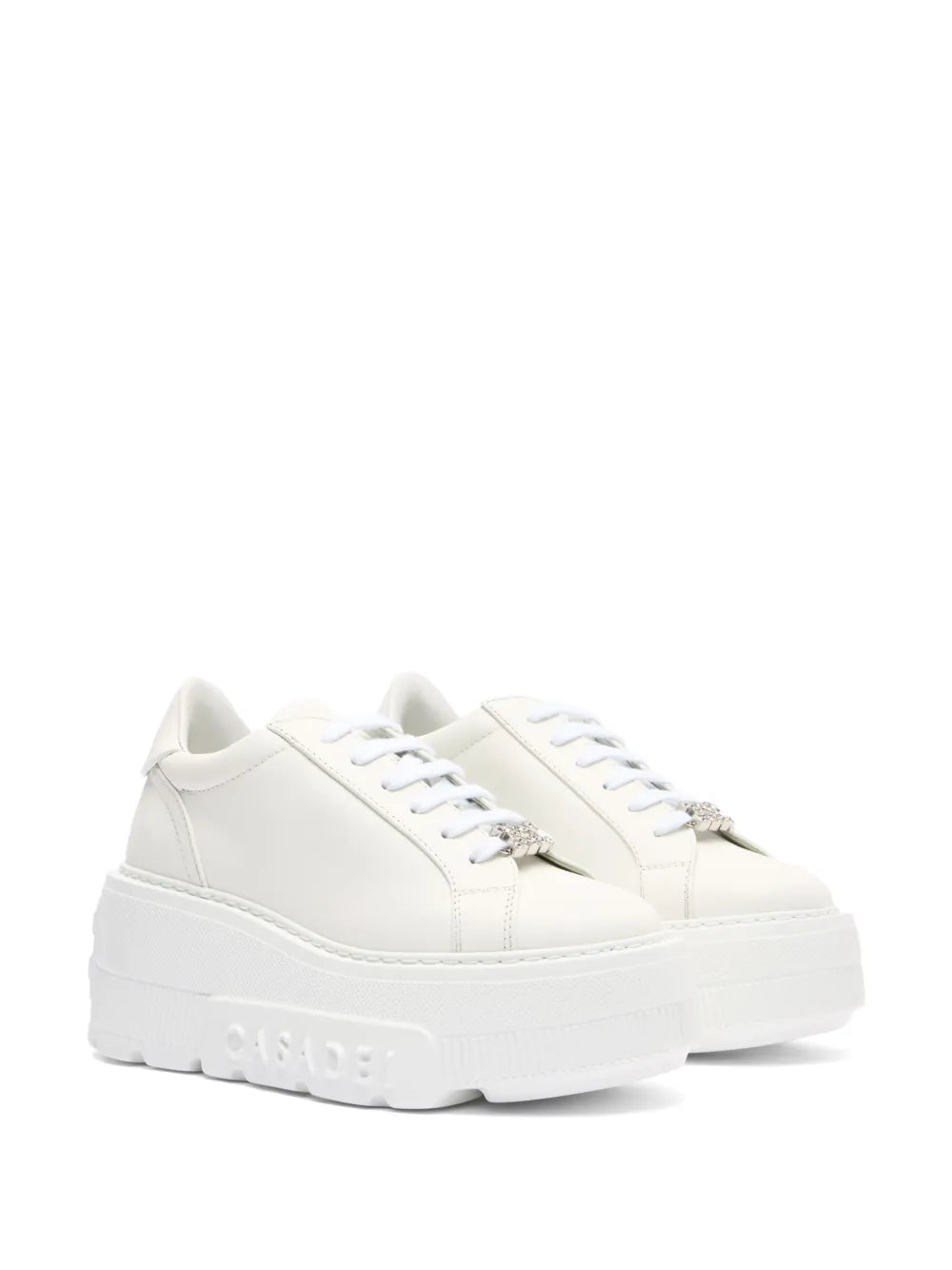 White leather platform sneakers, side view, lace-up with silver-toned embellishment