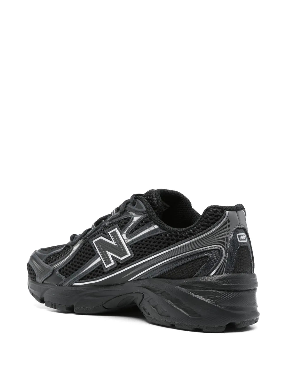 Black lace-up sneakers from rear angle, side N logo, padded collar, chunky midsole