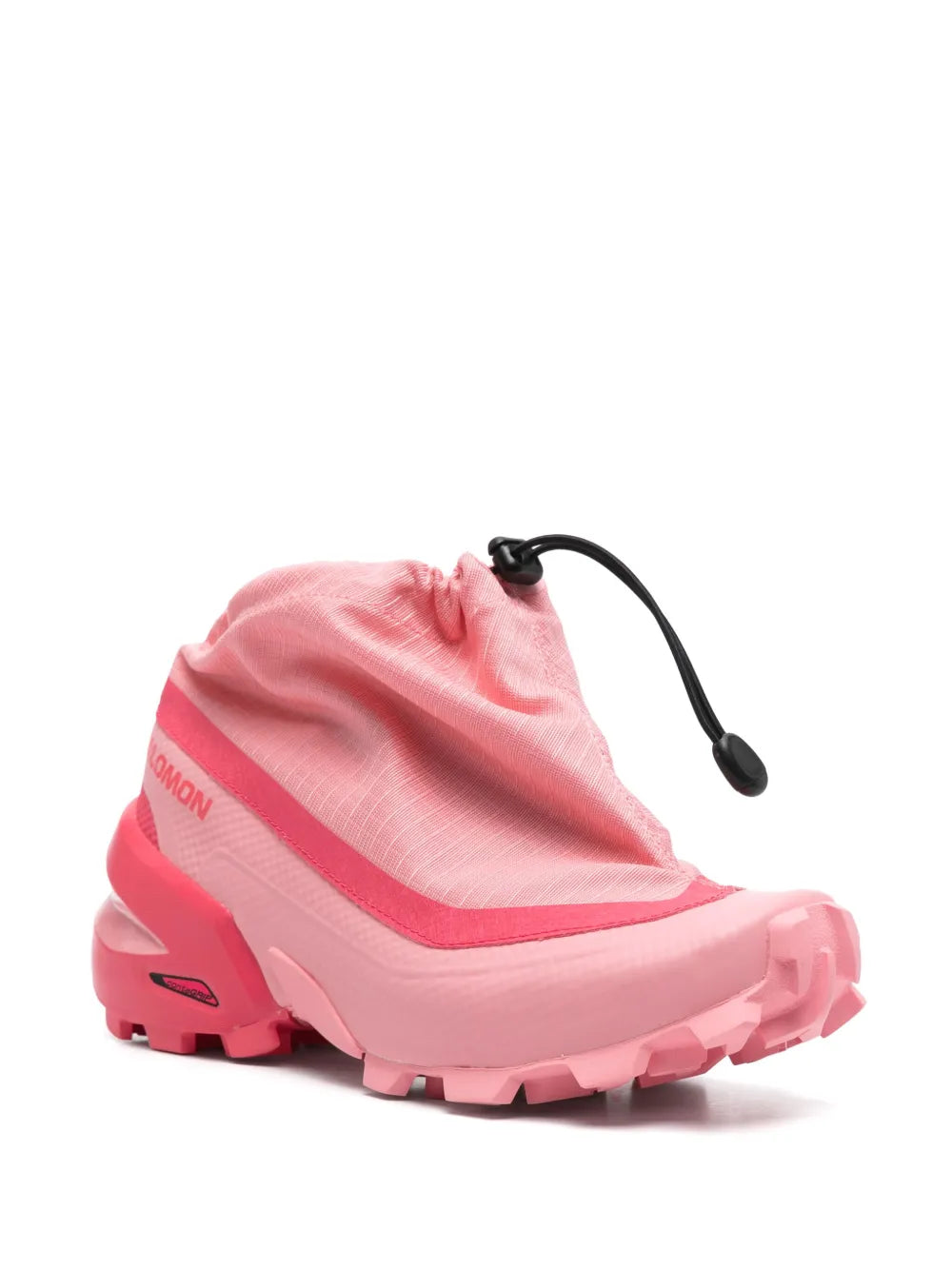 Pink low-top sneakers with black drawstring and textured tread sole
