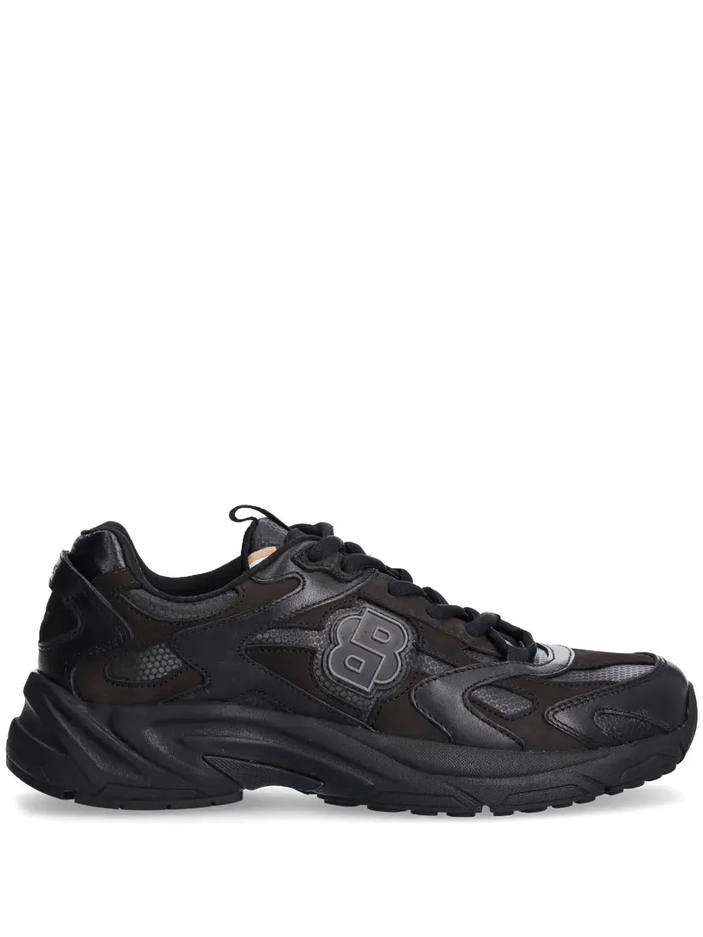 Black running sneakers with lace-up front and sporty side logo