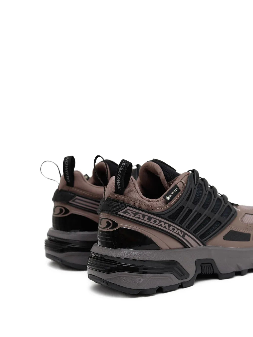 Salomon trail running shoes, rear three-quarter view, black and taupe, thick outsole