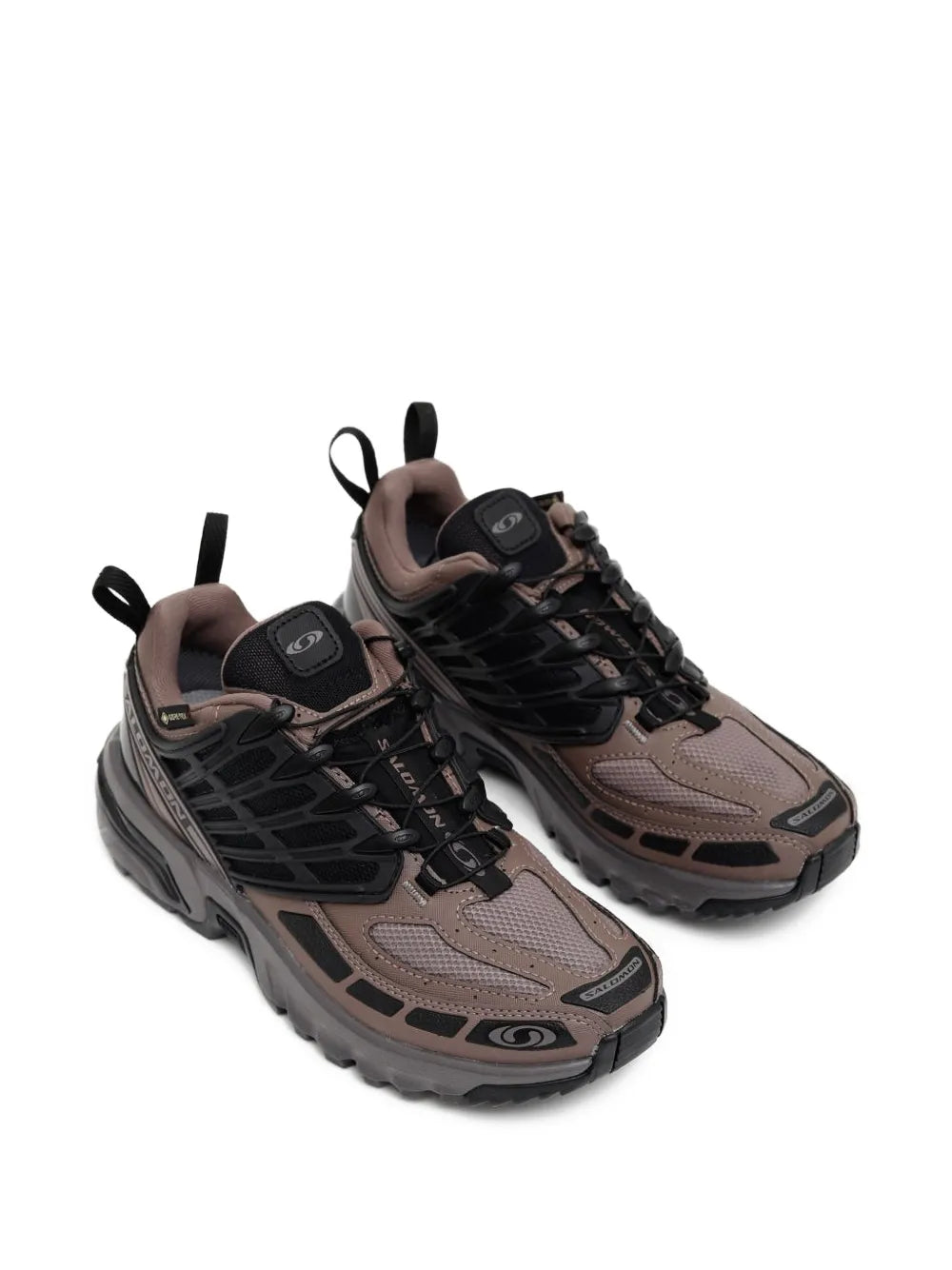Salomon lace-up trail running shoes, black and taupe, side view with rugged tread