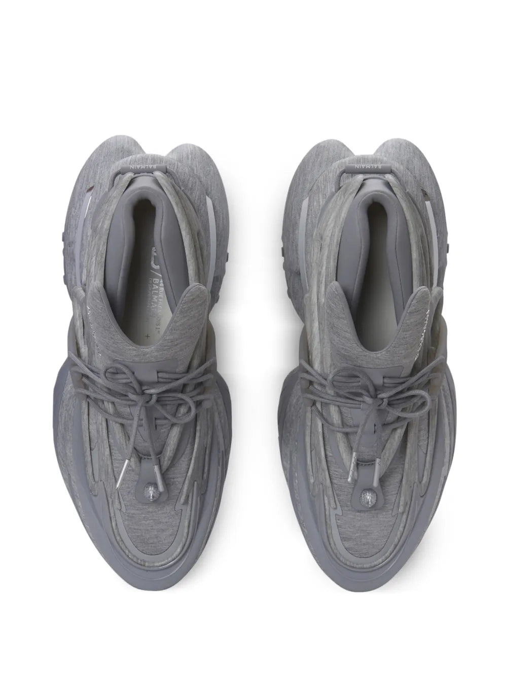 Medium grey sneakers, top view with lace-up closure and padded tongue