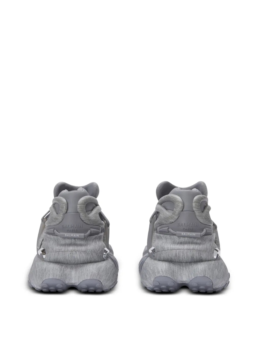 Medium grey low-top sneakers, rear view with lace-up and cushioned heel tabs