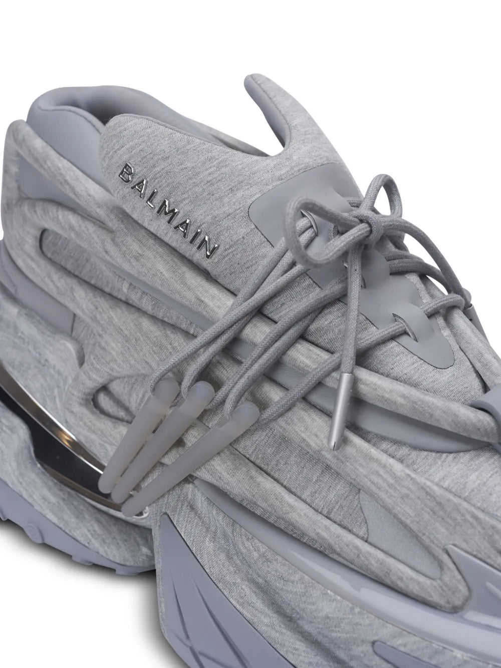 Medium grey lace-up sneakers with rubber side stripe detail and logo on the tongue
