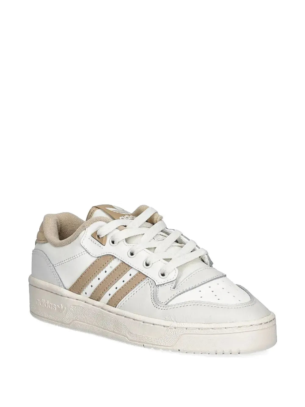 White low-top sneakers with beige three-stripe panel and white laces